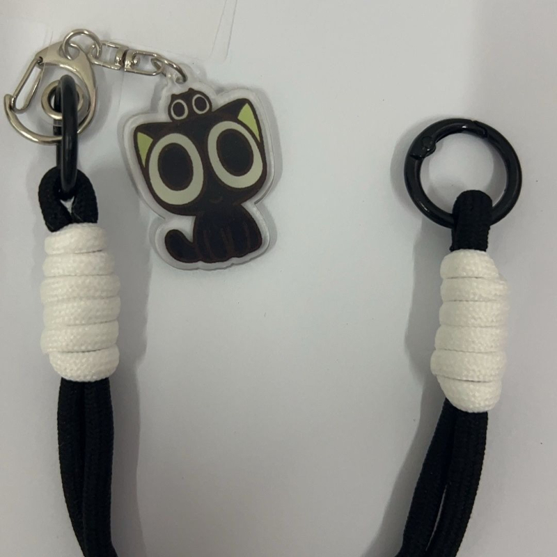A stylish black cat-themed ant - đánh giá và giá Phone Accessories Hanger